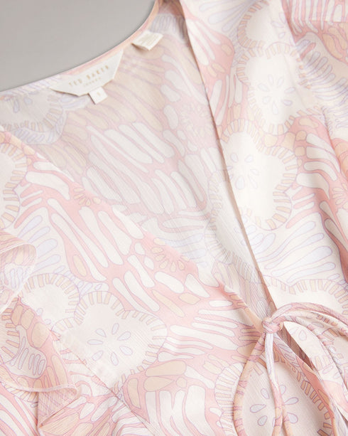 IRVETE-Trousers-Ideal for sunny walks along the river or enjoying a pub lunch, IRVETE is as easy to throw on as it is captivating. Finished with ruffles, this romper is a must-have for your summer wardrobe. Ted Baker womenswear collection Romper Soft ruffle detail Fully lined Our model is 5'9" / 1.75m and wears a Ted size 1- Ted Baker Romania